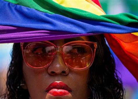 Tens Of Thousands Join Gay Pride Parades Around The