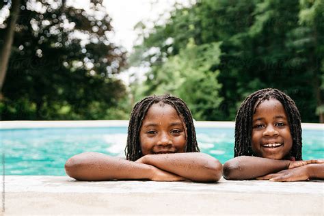 Two Black Girls By The Edge Of A Swimming Pool By Gabriel Gabi Bucataru