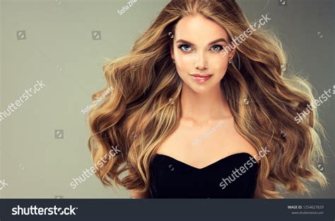 Laughing Blonde Girl Long Shiny Wavy Stock Photo 1254627829 Shutterstock