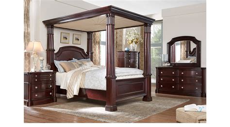 This cherry wood bedroom set corresponds perfectly well with the hardwood floors, creating a traditional, yet smooth, timeless appeal. Dumont Cherry 9 Pc Queen Canopy Bedroom - Traditional