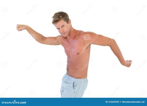 Shirtless Man Gesturing And Showing His Muscles Stock Photo Image Of Cheerful Camera
