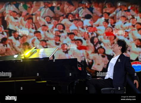 Chinese Pianist Lang Lang Performs During A Gala Celebrating The