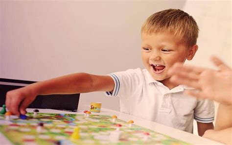 Child Playing With A Board Game Progress