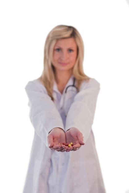 Premium Photo Female Doctor Holding A Pill In Her Hand