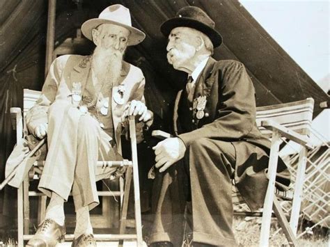 A Confederate And Union Veteran Exchanging Stories At The 1938