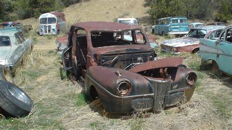 Twelve Rusty Cars