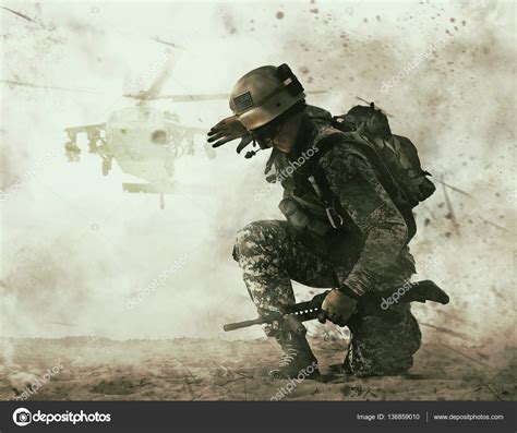 Us Soldier And Combat Helicopter Approaching Stock Photo By ©zabelin