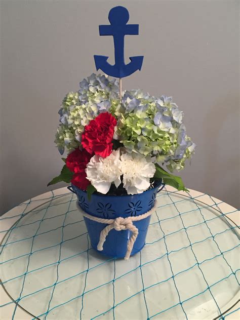 Nautical Fresh Flower Centerpiece With Anchor Pick In Pail And Rope With