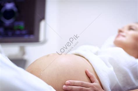 Pregnant Woman Undergoing Ultrasound Scanning At The Prenatal Clinic