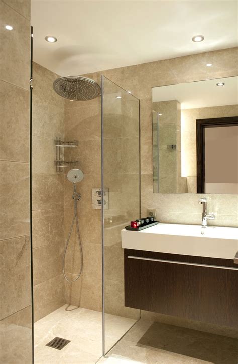 The subtle marble effect design makes these tiles a stylish option for beige bathroom tiles or for neutrally coloured. large tiles | Small bathroom renovations, Ensuite bathroom ...
