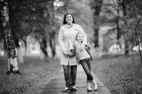 Premium Photo Mother Hugging Her Daughter In Summer Park Walk