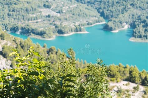 Breathtaking View Of The Guadalest Reservoir Lake With Azure Water In