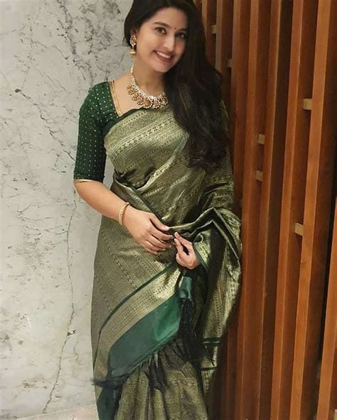 actress sneha is diwali ready in an emerald green kanchipuram saree