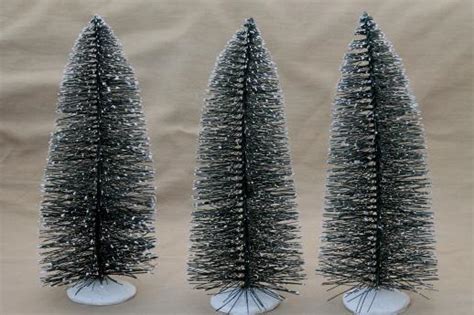 In search of christmas tree supplier (i.redd.it). bottle brush pine trees w/ flocked snow, tree forest for ...