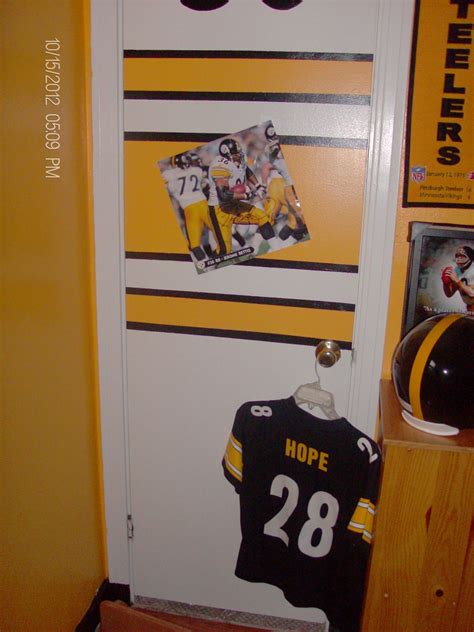 Most bedroom decorating ideas feature the bed by centering it on the wall. One of the bedroom doors in my Steelers room (With images ...