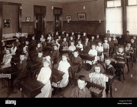 Vintage Classroom Of School Children At Desks Circa 1890s Stock Photo