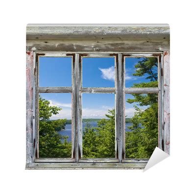 Scenic view seen through an old window frame Wall Mural • Pixers® • We ...