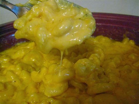 Add cheeses and melted butter to the slow cooker then gently stir until well combined. Crock Pot Mac and Cheese | Boy Meets Bowl