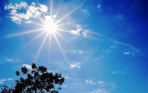 The Daytime Sun With Starry Sky With Bright Blue Sky And Light Clouds