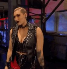 Rhea Ripley Smirk GIF Rhea Ripley Smirk Strong Discover Share GIFs