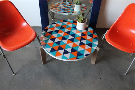 When you find something level that's the right height, make an inexpensive diy table by topping it with granite, marble, glass, or wood. DIY Tutorial- Painted Glass Table Top - Kara Paslay Design | Kara Paslay Design