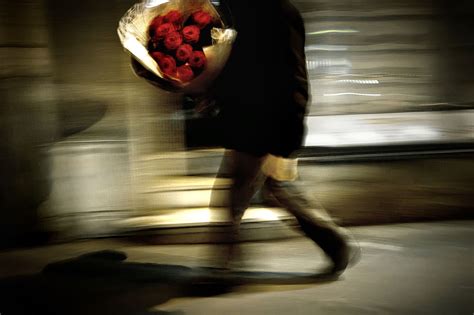 A Man Carries A Bouquet Of Red Roses Dur Cnn