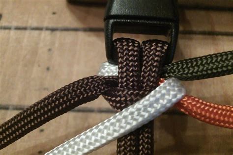 Next, gather the strands, measure down 5 inches, and tie an overhand knot, which is where you wrap the rope into a loop and push the end through. How to Tie a 4 Strand Paracord Braid With a Core and Buckle. | Paracord braids, Paracord ...