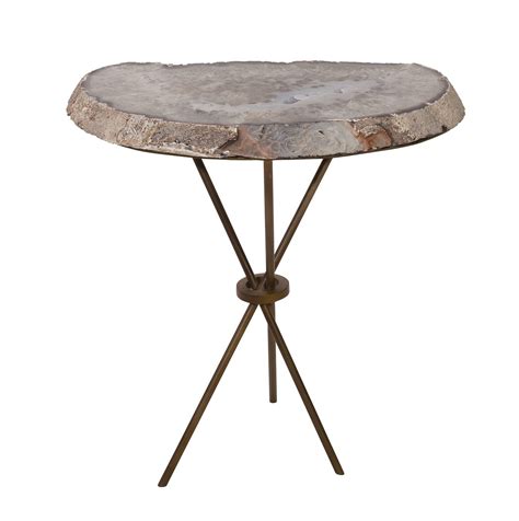 A purple and pink geode coffee table on metal legs and with a glass tabletop. Geode Coffee Table for Modern Furniture