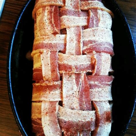 A peeled and halved onion added to. Salted Pork Loin with Applewood Smoked Bacon...Roast@ 300º ...