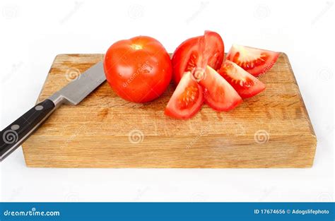 Tomatoes On Cutting Board Stock Photo Image Of White 17674656