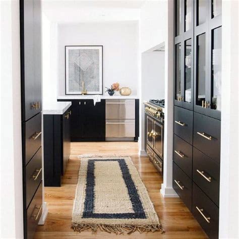 When you are looking for an elegant look, use a dark stain with your hardware. Top 50 Best Black Kitchen Cabinet Ideas - Dark Cabinetry Designs