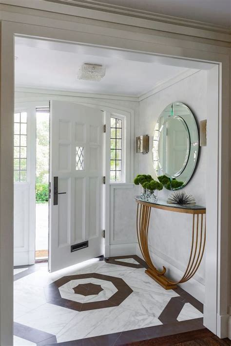 How To Decorate A Foyer Wall Leadersrooms
