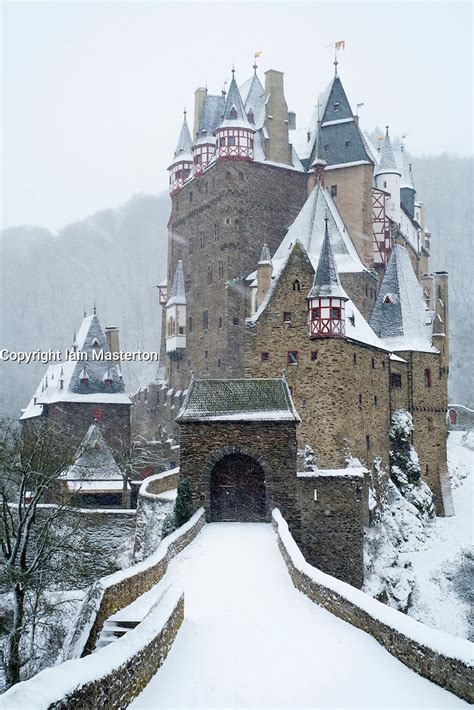View Of Burg Eltz Castle In Winter Snow In Germany Iain Masterton