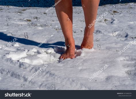 Woman Walks Her Bare Feet Snow Stock Photo 1673580370 Shutterstock