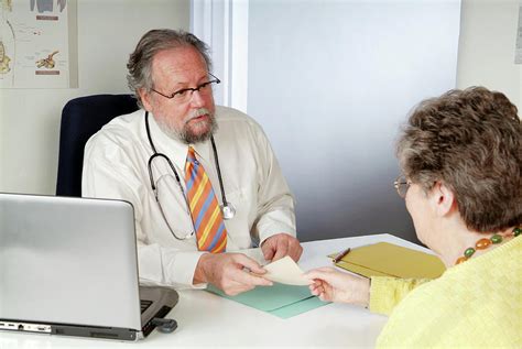 Doctor And Patient Consultation Photograph By Cc Studioscience Photo
