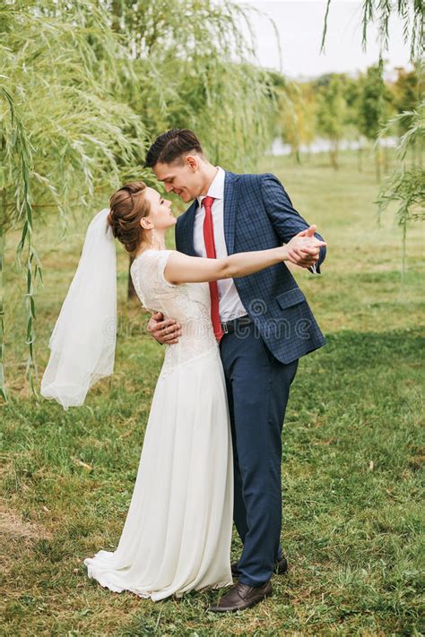 Smiling Cute Couple Dancing Among Willow Trees Stock Image Image Of