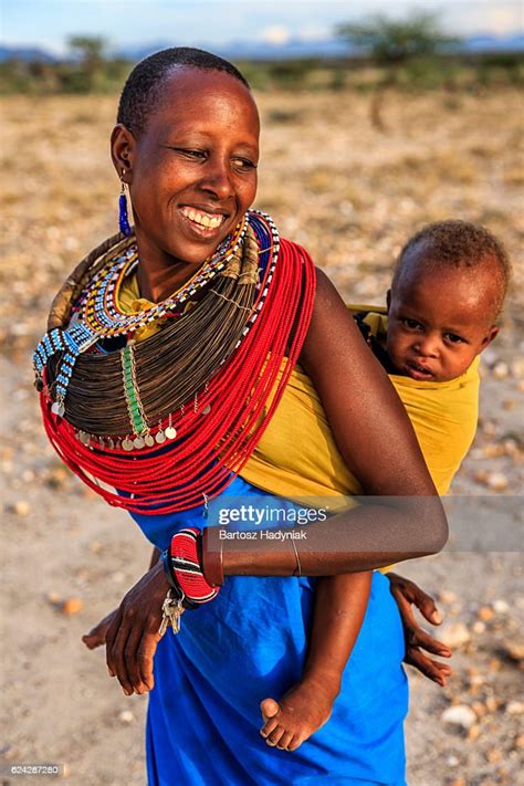 Young African Woman Carrying Her Baby Kenya East Africa High Res Stock