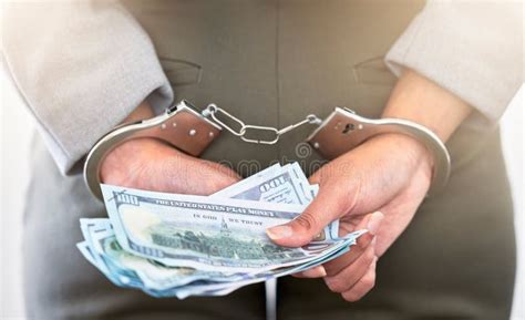Handcuffs Dollars And A Business Woman Arrested For Theft At Work Stock Image Image Of