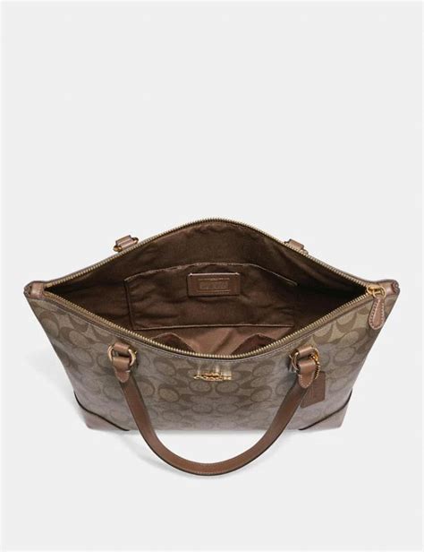 Coach Outlet Zip Top Tote In Signature Canvas