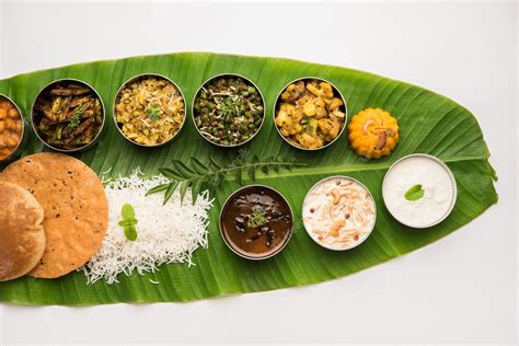 Premium Photo Traditional South Indian Meal Or Food Served On Big Banana Leaf Food Platter Or