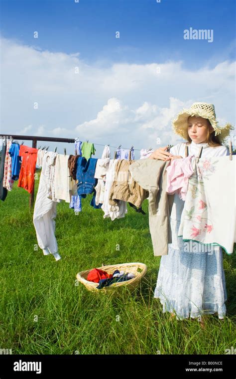 Old Lady Hanging Clothes On Hi Res Stock Photography And Images Alamy