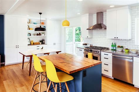 In addition to the yellow accents and brightly painted wall, this kitchen pulls in the yellow hue in the checkered floor tiles as well. Rocky Butte Remodel (Portland Oregon) - Contemporary ...