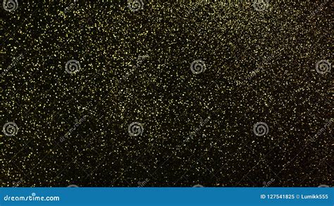 Gold Glitter Dust Scattered On Black Background Stock Image Image Of