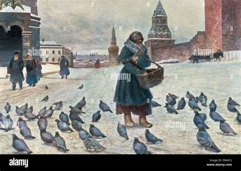 Russian Woman Feeding Pigeons Stock Photo Alamy