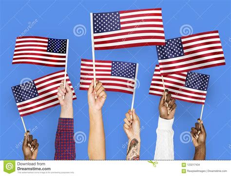 Hands Waving Flags Of The United States Stock Photo - Image of symbol, waving: 123217434