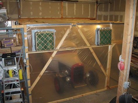 The Inside Of A Garage That Is Being Built With Metal And Wood Panels