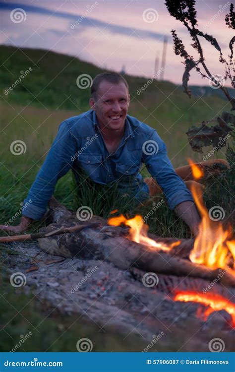 Man Sitting Near Fire Stock Image Image Of Panorama