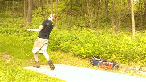 Demonstrating The First Throw From A Tee Pad On Classic Disc Golf