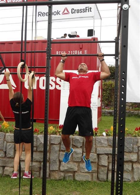 Participants Power Through Pull Ups During This Wod In Lima Crossfit