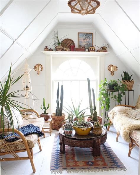 Cute Bohemian Attic Seating Area With Big Window Ball And Claw